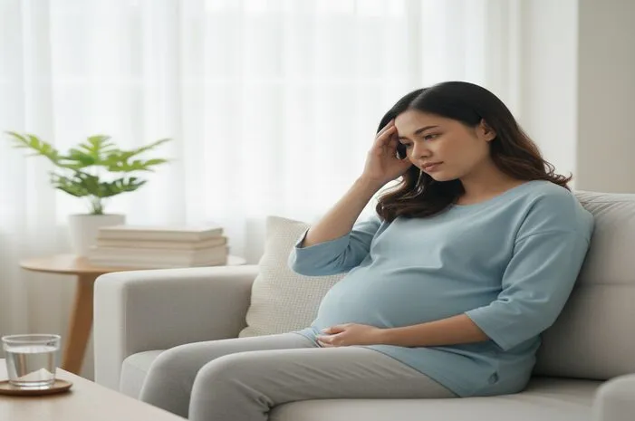 Sakit Kepala Trimester 1 Hamil? Ini Penyebab dan Cara Atasinya