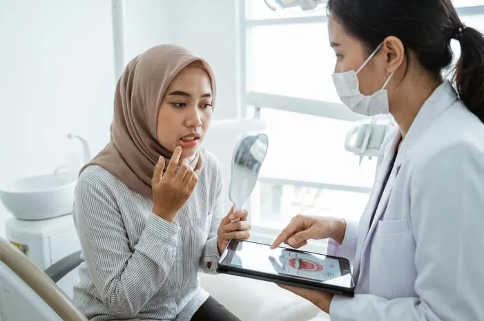 Kenapa Gusi Hitam? Bukan Cuma Merokok, Lho!