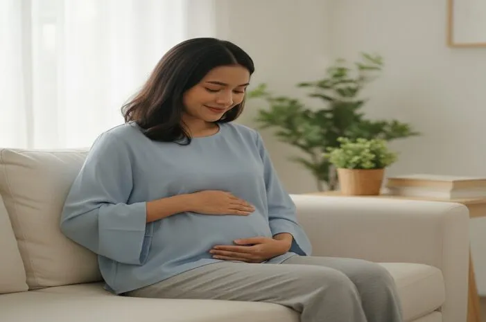 Perut Terasa Kencang, Apakah Tanda Hamil? Cek Yuk!